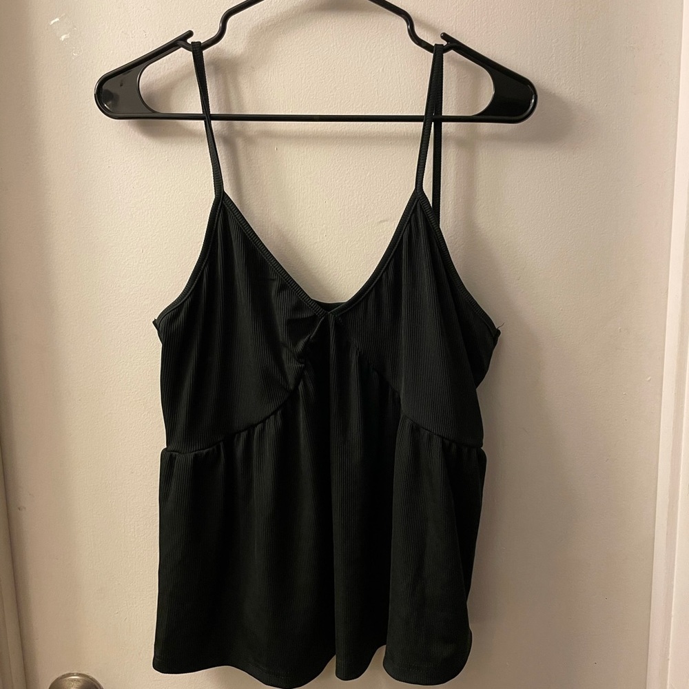 Peplum black tank top.